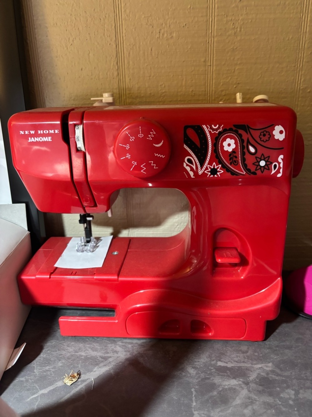 New Janome Petite Red Sewing Machine with Paisley Accent. Perfect condition!